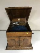 An early 20th century oak cased table top gramophone