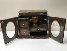 An Edwardian Oak Smoker's cabinet