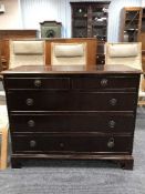 A mahogany five drawer chest on bracket feet