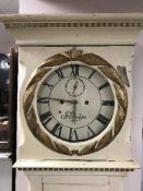 A painted longcased clock with pendulum and weights by R Jacobsen