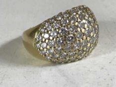 A gold and diamond set bombay style cluster ring