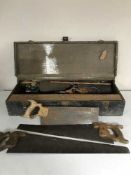 A wooden joiner's tool box and tools