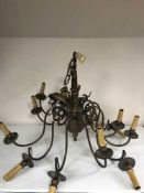 A continental twelve branch chandelier