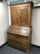 A 19th century oak bureau bookcase