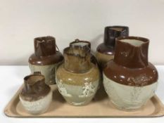 Six antique pottery jugs inc,