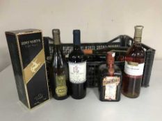 A crate of fourteen bottles of wine and spirits inc.