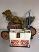 A Fisher Price Family Play Farm, a mid 20'th Century child's trike and two Teddy bears.