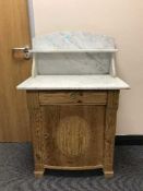 An early 20th century marble top wash stand