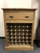 A reclaimed pine bottle rack