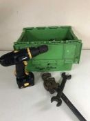 A crate of twelve volt performance drill and a large quantity of hand tools, ring spanners,