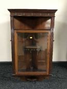 A Victorian mahogany glazed door curio cabinet