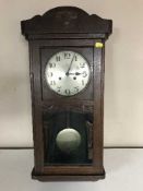 An oak wall clock