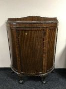 A mahogany d-shaped cabinet