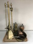 A tray of antique brass and copper ware, brass teapot, companion set,