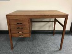 A mid 20th century teak desk