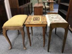 An inlaid music table and a two dressing table stools