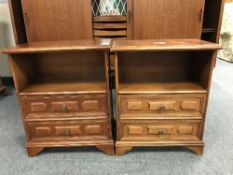 A pair of stained beech bedside stands