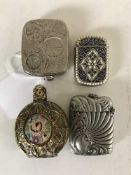 A silver plated and enamel vesta, together with another vesta,