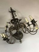 A decorative twelve branch chandelier