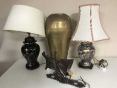 A cast metal bell on bracket depicting a Labrador together with a large brass vase with two table