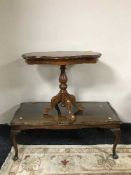 An occasional table and glass top coffee table