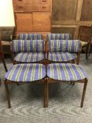 Four mid 20th century teak dining chairs