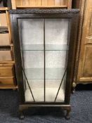 A walnut glazed display cabinet
