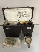 A mid 20th century surgeon's kit in leather case.