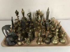 A collection of assorted of metal bells - bottle openers,