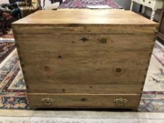 A pine mule chest fitted a drawer