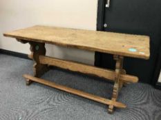 A late 19th century oak refectory dining table