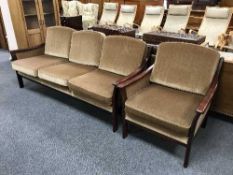 A wood framed three seater settee and armchair