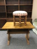 An oak refectory coffee table and a hexagonal stool
