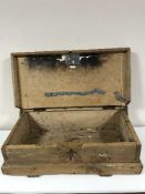 An antique pine storage box