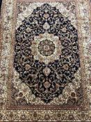 A Persian Kashan rug on blue ground 1.90 x 1.