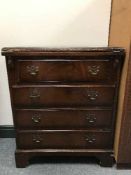 A mahogany Georgian style four drawer chest