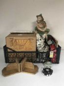Two crates of assorted china, tankards, beer steins, chalk figures, wooden bookends,