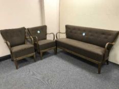 A mid 20th century walnut framed three piece lounge suite