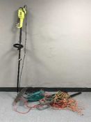 A Ryobi electric strimmer,