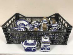 A basket of Ringtons blue and white china, coffee pot,