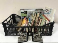 A box of books relating to motor racing and transport,