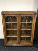 An Edwardian carved oak bookcase