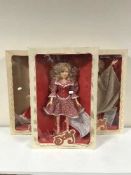 Three boxed Dolly Parton collector's dolls