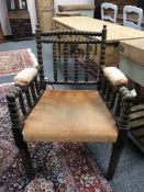 An oak bobbin armchair
