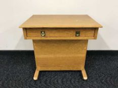 A contemporary oak Davenport desk