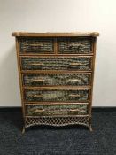 A bamboo and wicker six drawer chest