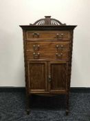 A Victorian inlaid mahogany music chest