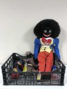 A basket of a quantity of golly soft toys