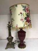 A decorative gilt metal lamp base together with a ceramic lamp with shade