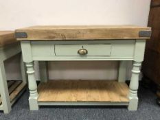 A painted pine butcher's block fitted with a drawer